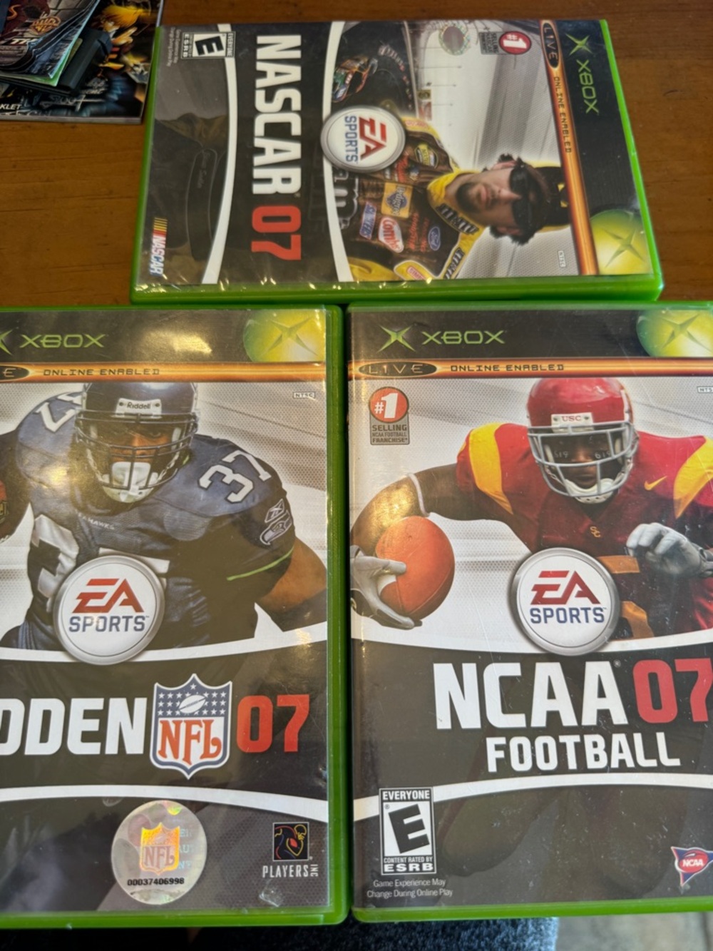 EA Sports Xbox Game Lot - NASCAR 07, Madden NFL 07, NCAA 07 - Green Cases